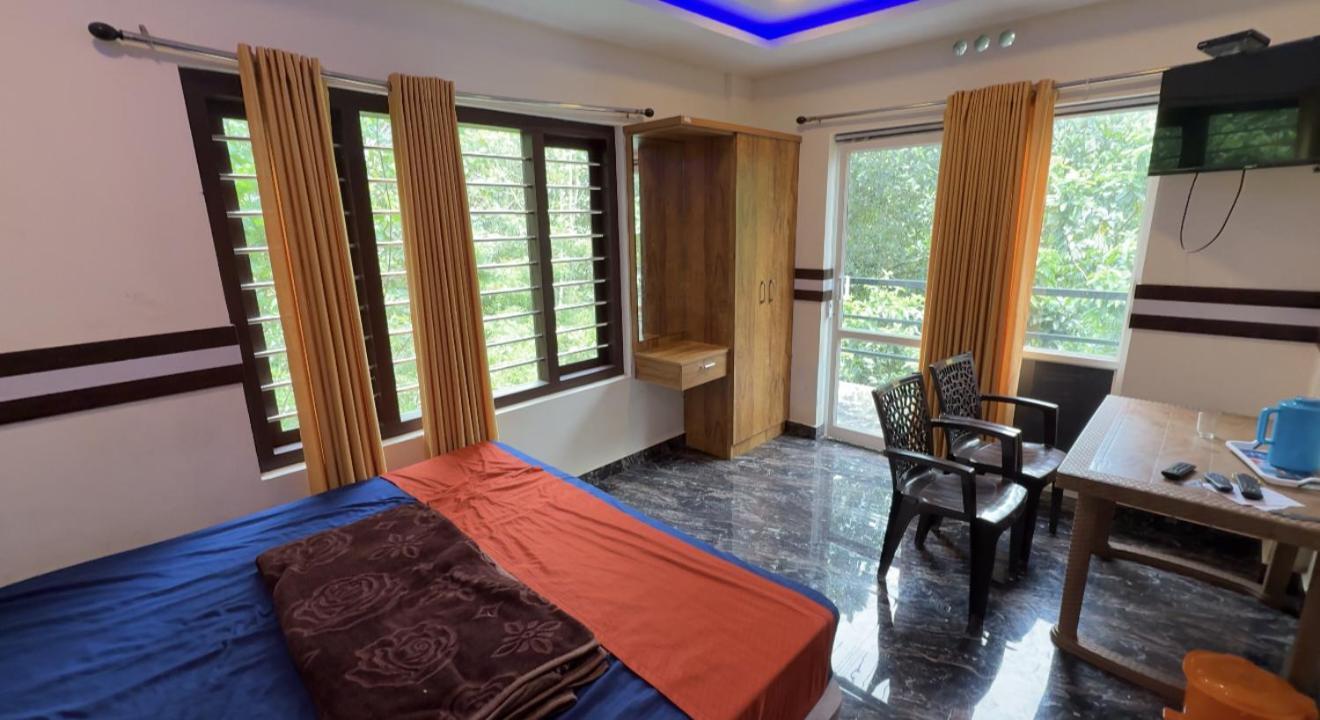 Hn Cottages, Munnar Jāmb Екстериор снимка